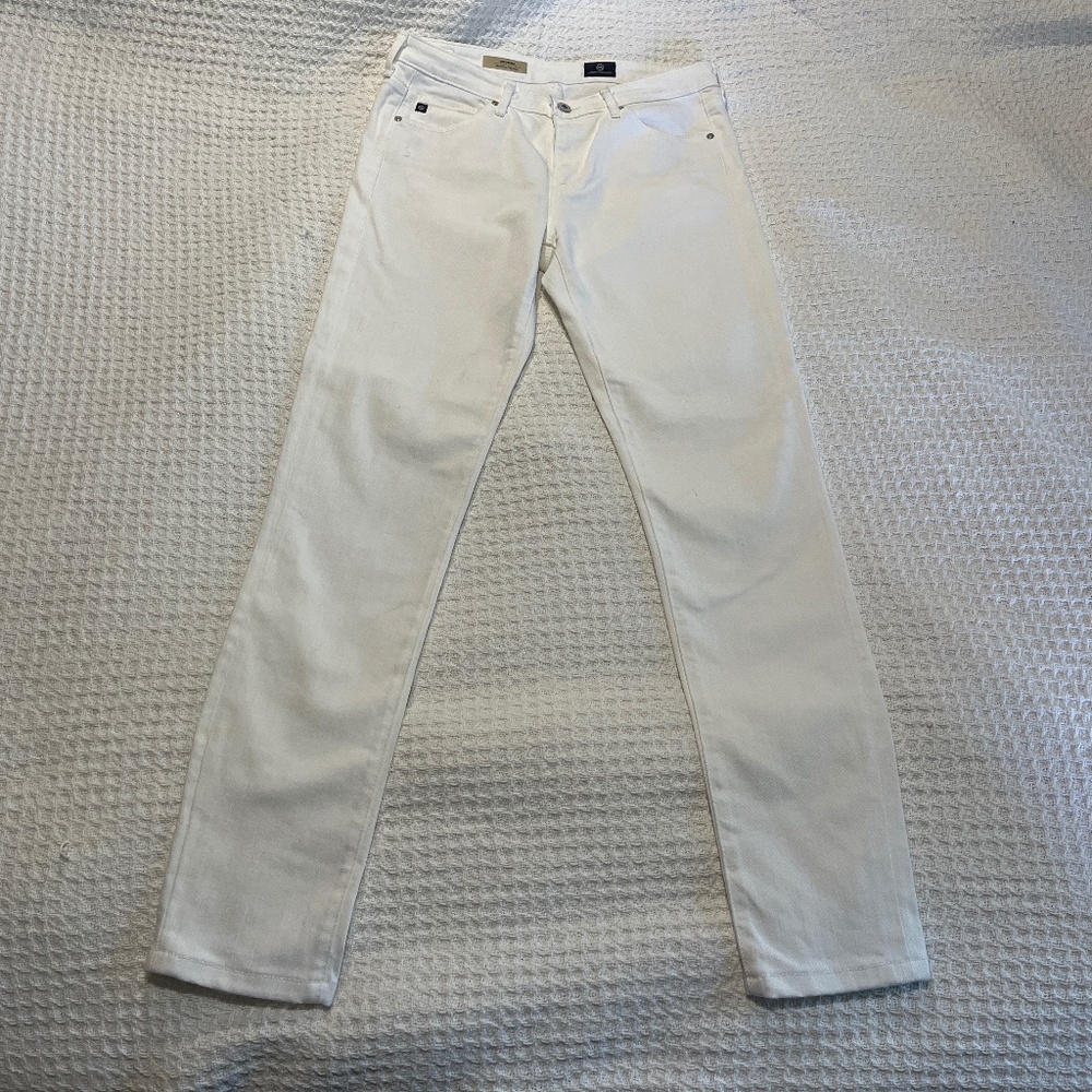 White Jeans. Slight ink stain next to the button.